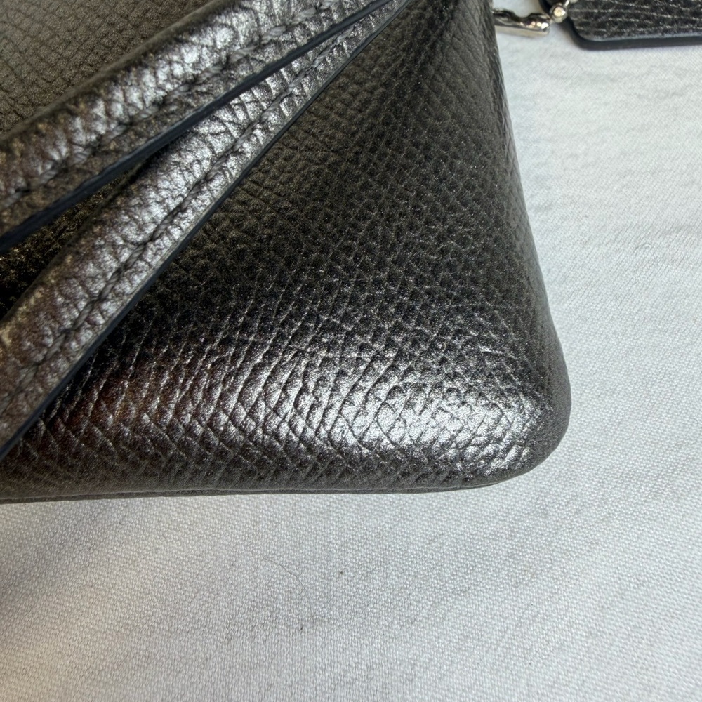 COACH Silver Pewter  Metallic Leather Zipper Wallet Wristlet
$199 
Authentic - Picture 6 of 11